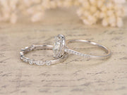 Superb 1.50 Carat Pear cut Moissanite & Diamond Wedding Ring Set in 10k White Gold