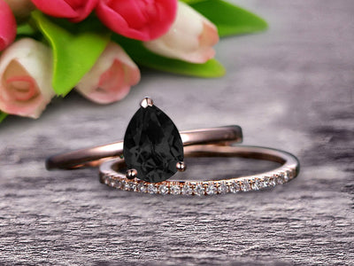 1.25 Carat Solitaire Pear Shape Black Diamond Moissanite Engagement Ring With Matching Wedding Band On 10k Rose Gold Bridal Ring Set Surprisingly