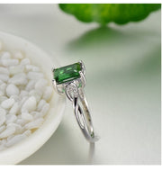 1 Carat Emerald and Moissanite Diamond Engagement Ring in White Gold