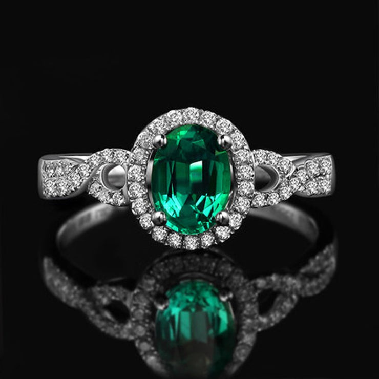 1 Carat Emerald and Moissanite Diamond Halo Engagement Ring in White Gold