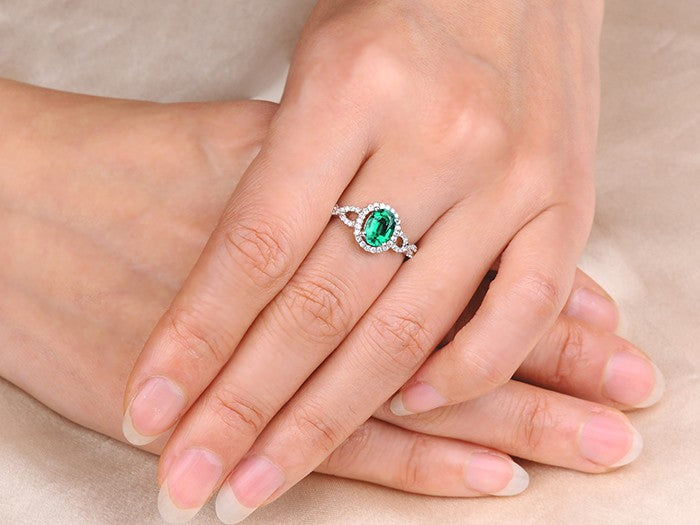 1 Carat Emerald and Moissanite Diamond Halo Engagement Ring in White Gold
