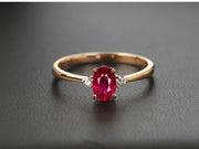 1 Carat Trilogy Ruby and Moissanite Diamond Engagement Ring in Rose Gold