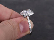 Art Deco 1.50 Carat Halo Moissanite & Diamond Engagement Ring in White Gold
