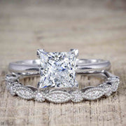 1.50 Carat Moissanite and Diamond Trio Bridal Ring Set in 10k White Gold
