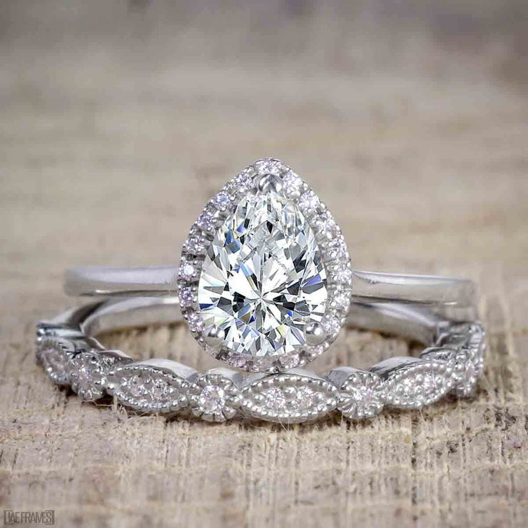 2 Carat Pear cut Moissanite and Diamond Halo Wedding Ring Set in White Gold
