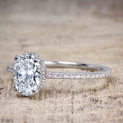 1.25 Carat Oval cut Wedding Set of Moissanite and Diamond in White Gold
