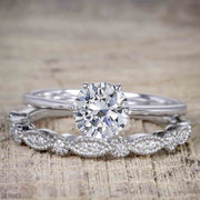 Vintage Design 1.25 Carat Round Cut Moissanite Engagement Ring in White Gold