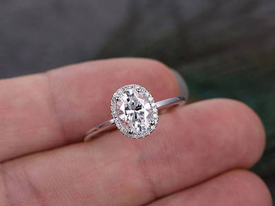 Oval cut Moissanite and Diamond Halo Engagement Ring 