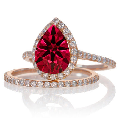 2 Carat Emerald and Moissanite Diamond Halo Bridal Ring Set on 10k Rose Gold