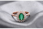2 Carat Emerald and Moissanite Diamond Halo Engagement Ring in Rose Gold
