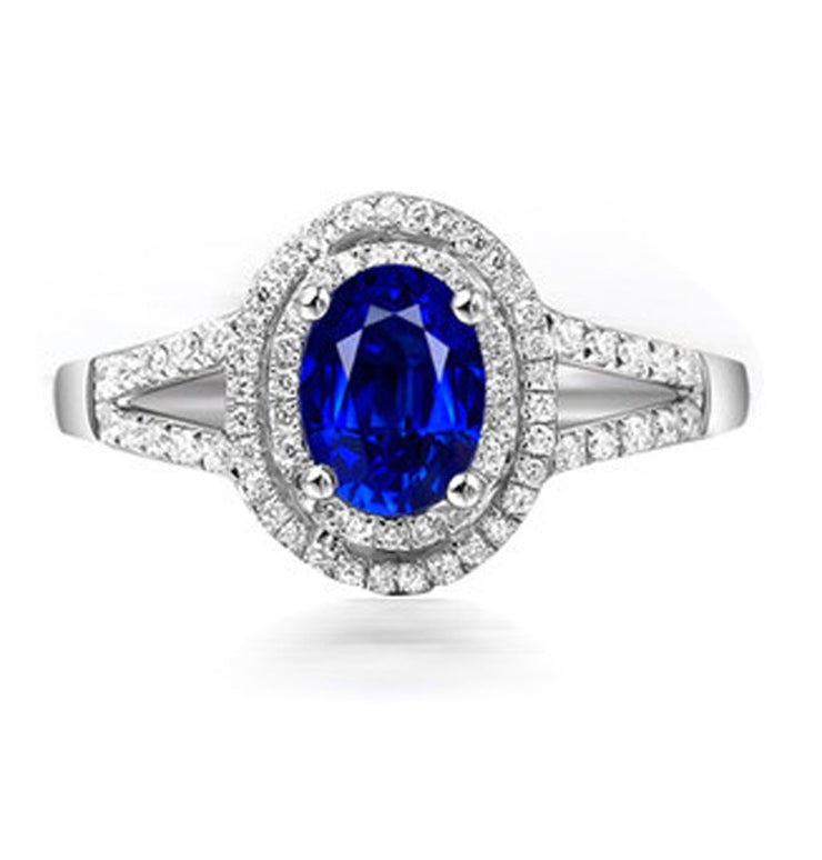 2 Carat oval cut Blue Sapphire and Moissanite Diamond Halo Engagement Ring in White Gold