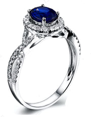 2 Carat oval cut Blue Sapphire and Moissanite Halo Engagement Ring in White Gold