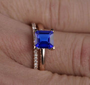 1.25 carat Blue Sapphire and Moissanite Diamond Halo Bridal Set in 10k Rose Gold