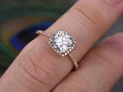 Antique Style 1.50 Carat Moissanite and Diamond Halo Engagement Ring in Rose Gold
