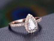 Classic Pear cut Halo 1.50 Ct Moissanite &  Diamond Engagement Ring in Rose Gold
