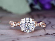 Round cut 1.25 Ct infinity style Moissanite & Diamond Engagement Ring in Rose Gold
