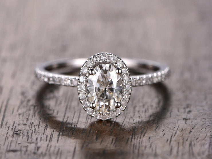 Oval Cut 1.25 ct Halo Moissanite and Diamond Engagement Ring in White Gold
