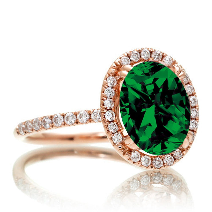 1.5 Carat Oval Classic Emerald and Moissanite Diamond halo ring on 10k Rose Gold