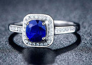1.50 Carat Blue Sapphire and Moissanite Diamond Halo Engagement Ring for Women in White Gold