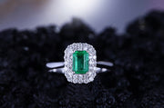 1.50 Carat Emerald and Moissanite Diamond double Halo Engagement Ring in White Gold