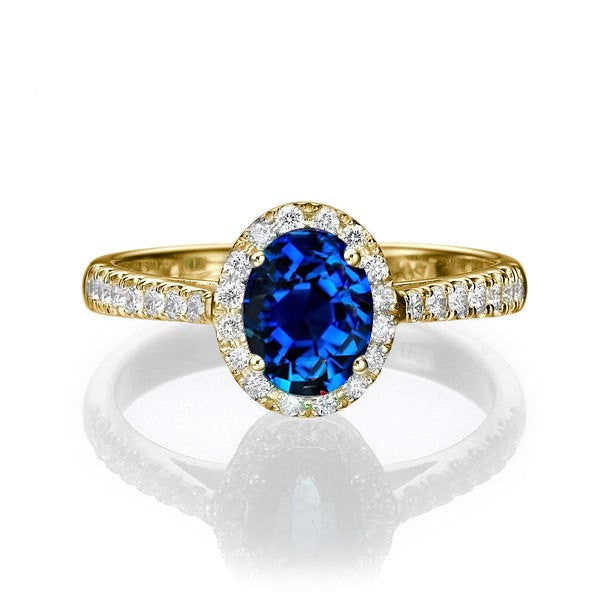 1.50 carat Oval Cut Sapphire and Moissanite Diamond Halo Engagement Ring in 10k Yellow Gold