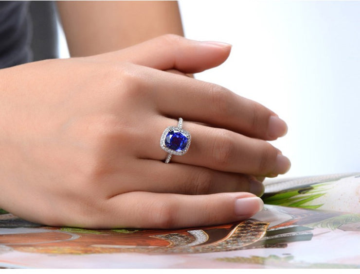 Antique 1.50 Carat cushion cut Sapphire and Moissanite Diamond Halo Engagement Ring in White Gold