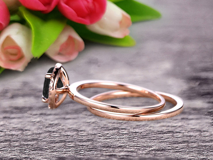 1.25 Carat Round Cut Black Diamond Moissanite Engagement Ring with Plain Matching Band On 10k Rose Gold 