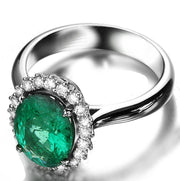 Beautiful 1.50 Carat oval shape Emerald and Moissanite Diamond Halo Engagement Ring in White Gold