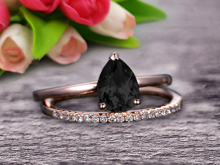 1.25 Carat Solitaire Pear Shape Black Diamond Moissanite Engagement Ring With Matching Wedding Band On 10k Rose Gold Bridal Ring Set Surprisingly