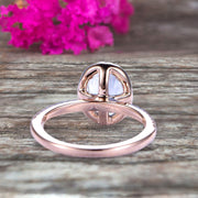 1.50 Carat Oval Cut Aquamarine Halo Engagement Ring on 10k Rose Gold 