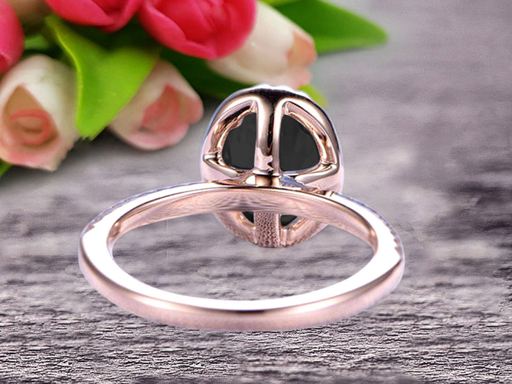 1.50 Carat Oval Cut Black Diamond Moissanite Halo Engagement Ring on 10k Rose Gold 