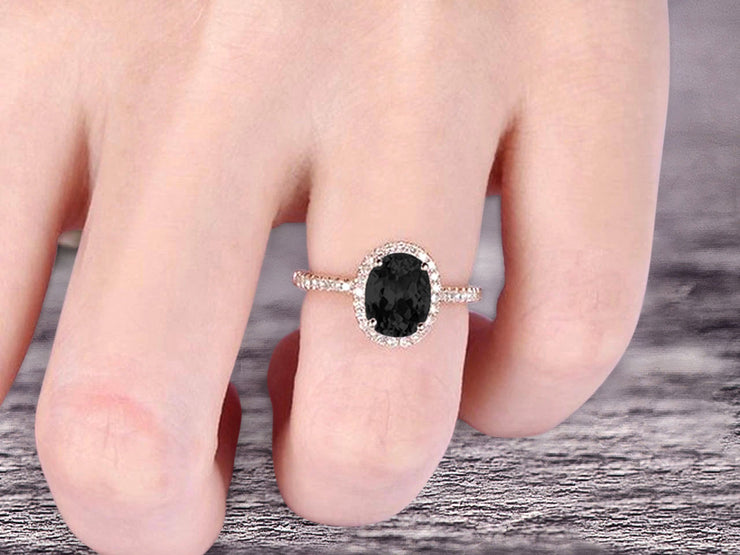 1.50 Carat Oval Cut Black Diamond Moissanite Halo Engagement Ring on 10k Rose Gold 