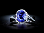 Inexpensive 1.50 Carat Blue Sapphire and Moissanite Diamond Infinity Engagement Ring in White Gold