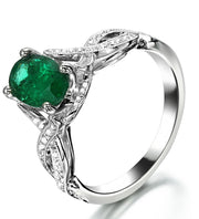 Infinity design 2 Carat Emerald and Moissanite Diamond curved Engagement Ring in White Gold