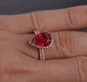 Perfect Bridal Set on Sale 1.50 carat Pear Cut Ruby and Moissanite Diamond Bridal Set in Rose Gold: Bestselling Design