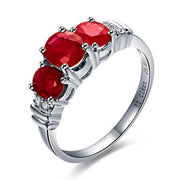 Three Stone Ruby and Moissanite Diamond Engagement Ring on 10k White Gold